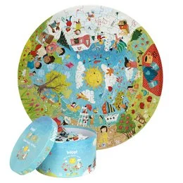 A round, colorful puzzle depicting the four seasons with various animals and nature elements. The puzzle has a diameter of approximately 24 inches and comes with a matching round storage tin.