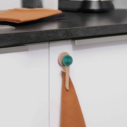  Wooden magnetic clip in 4 colors - blue, orange, cherry red, and green apple - for hanging tea towels.
