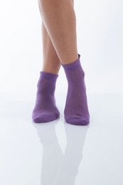 "Purple socks with a simple, minimalist design. Made from soft, breathable material for all-day comfort."