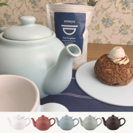 A 1.5 liter white ceramic teapot with a variety of color variants including terracotta rose, ice, leaf, and almost black.