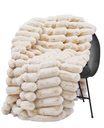 Beige, chunky knit throw blanket with a textured, wavy pattern. Made of soft, cozy material suitable for living rooms, bedrooms, or as a decorative accent piece.