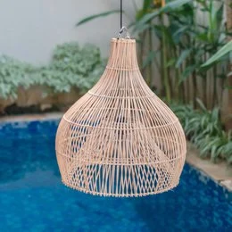 Rattan lamp with a woven, bell-shaped lampshade. Available in medium and large sizes, as well as a set. The lamp features a natural, earthy design that would complement a variety of indoor or outdoor spaces.