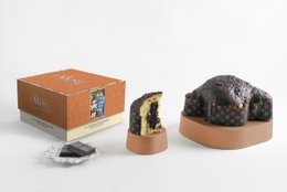  Colomba I Mori with black chocolate of Modica, a chocolate gift item. The product features a round, tall chocolate cake with a dark chocolate coating, packaged in a brown box.
