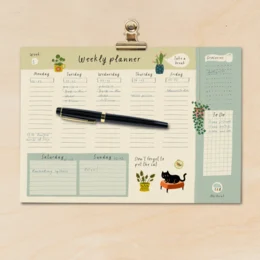 Weekly planner with floral and cat illustrations, designed for organizing daily and weekly tasks.