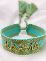 'Festival bracelet 1.5 in the Charm Bracelets category, featuring variants like Love, Hope, J'adore light blue, Peace, Karma, Festival Bracelet Make It Happen, Life Is Good, and Angel on Earth. The bracelets have embroidered text and designs.'