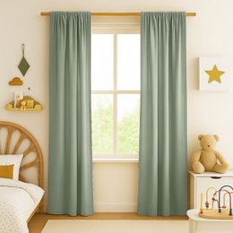 Organic cotton gauze curtains in a soft green color, suitable for a bedroom or nursery.