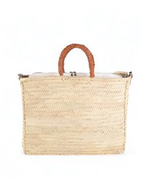  A woven straw tote bag with leather handles and trim. The bag has a rectangular shape and a natural, earthy appearance.