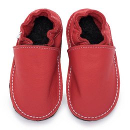  Red leather slippers with black interior. Comfortable and stylish footwear for indoor use.