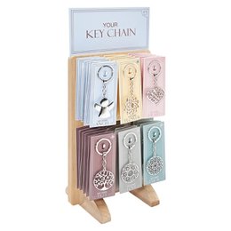  Decorative metal keychain with a tree of life symbol, available in various colors.