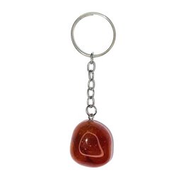  Carnelian stone keychain with a tumbled, polished finish in a warm, reddish-brown color.