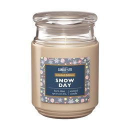  A large, round, glass candle jar with a white lid. The candle is a light beige color and the label on the jar features a winter scene with snowflakes.