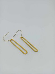  Yellow enamel drop earrings with a simple, elongated rectangular shape.