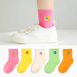 Children's long flower socks in a pack of 5 pairs, available in sizes 12-24 months, 2-4 years, 5-8 years, and 9-12 years. The socks feature colorful flower designs in various bright colors.
