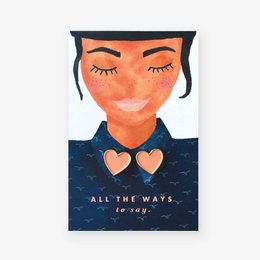 Colorful pin featuring a stylized face with heart-shaped eyes and the text "All the ways to say".