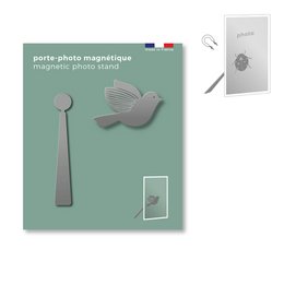 Magnetic metal photo holder with a bird design, suitable for displaying photos on a surface or attaching to a refrigerator or other magnetic surface.