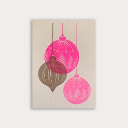  Pink and gold Christmas ornaments with intricate patterns and shapes.