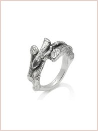 Anello Arboreal is a stack ring featuring a unique arboreal design in gold or burnished finishes, available in sizes 50-64. The intricate, nature-inspired design creates a visually striking and textured piece of jewelry.