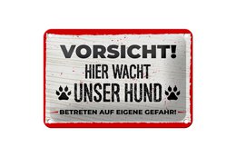 Rectangular tin sign with German text "VORSICHT! HIER WACHT UNSER HUND" (Caution! Our dog watches over here!) and paw print icons. The sign warns of a watchdog on the premises.