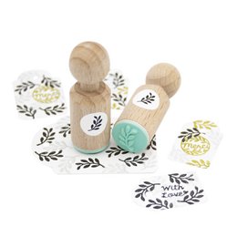 Elegant olive branch mini stamp for refined creations. Wooden stamp with leaf-shaped design, suitable for crafting and decorating.