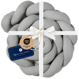 A large, grey braided bed bumper made of knitted material, suitable for an extra-large crib.