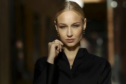 Gold-toned ring with a square-shaped smoky quartz stone. Minimalist and elegant design suitable for stacking or wearing alone.