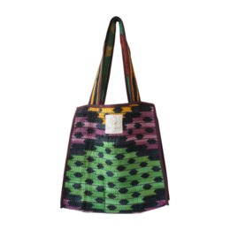  Colorful tote bag with geometric patterns in shades of green, yellow, and purple. Made using traditional kantha embroidery technique.
