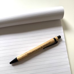 Wooden bamboo pens with text "This pen is of the sweetest teacher!"
The product is a set of wooden bamboo pens. The pens have a natural, earthy look and feel, with a bamboo material. The text on the pens reads "This pen is of the sweetest teacher!", suggesting they may be a gift or promotional item for teachers. These pens would be suitable for writing, drawing, or general office/school use.