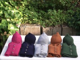 Set: Baby cardigan & Secret Santa hat made from 100% finest merino wool - the perfect gift for a birth