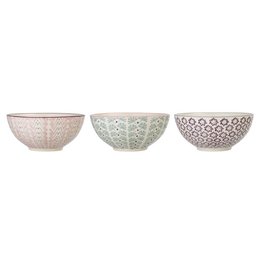Purple stoneware bowl with a textured, dotted pattern. Durable and suitable for everyday use in the kitchen or on the dining table.