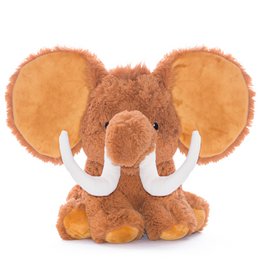 A large, plush mammoth toy with a soft, orange-brown fur coat and large, floppy ears. The mammoth has a prominent trunk and two large, curved tusks protruding from its face, giving it a distinctive and endearing appearance.