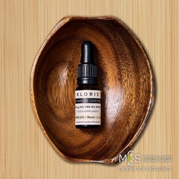500mg (5%) CBD Oil Drops - 10ml, a CBD oil product in a wooden bowl with a dropper bottle.
