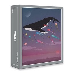 A 500-piece jigsaw puzzle featuring a whimsical illustration of a whale swimming through a colorful, dreamlike landscape with a crescent moon in the night sky.