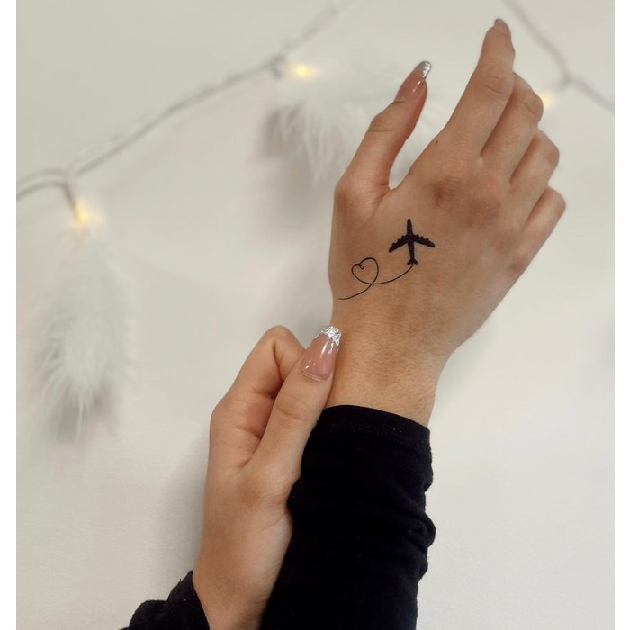 Small airplane tattoo - Tattoogrid.net