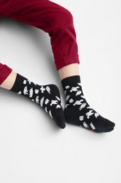 Organic children's socks with a colorful ghost pattern, available in sizes 2/3Y, 4/6Y, and 7/9Y.