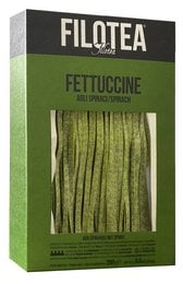 Fettuccine pasta made with spinach, 250 grams. Green fettuccine noodles in a green and white package.