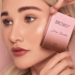 Brown soap booster for eyes with a sleek, compact design.