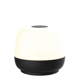 Black and white modern table lamp, round dome shape, soft warm light, contemporary design, indoor outdoor lighting.