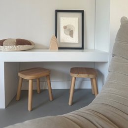 Black and white framed abstract art piece featuring organic shapes and textures.