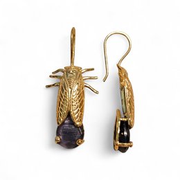  Gold gilded cricket insect earrings with dark purple gemstone drop, statement jewelry with nature-inspired design.