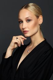 Elegant silver necklace with a rectangular pendant, perfect for adding a touch of sophistication to any outfit.