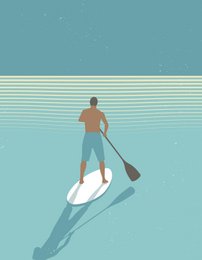 Paddleboarder o zachodzie słońca