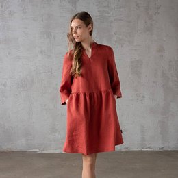 Brick-red linen dress with a flared skirt and long sleeves. Casual yet stylish, perfect for everyday wear.