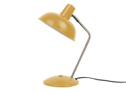 A yellow table lamp with a round shade and a metal base. The lamp has a simple, minimalist design and is suitable for use on a desk or side table.