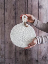  Round crocheted cheese board in sand, baby blue, petrol blue, pink, white, and yellow colors.