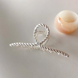 Minimalistische gedraaide lijn grote klauw haarclip