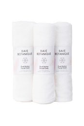 A set of 3 white facial cleansing cloths for skin care. The cloths are made of soft, absorbent material and are designed for dual action cleansing and exfoliation.