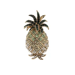 Gold pineapple brooch with green black crown, textured diamond pattern, tropical fruit design pin.