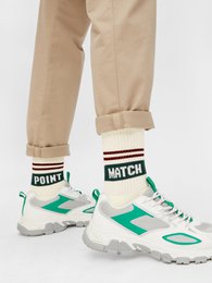 White tennis socks with Match Point lettering, made of organic materials, suitable for athletic activities.