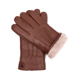 Warm, durable leather gloves with a soft, insulated lining for cold weather. Available in cognac, black, and dark brown colors. Designed with a classic style and stitched details.