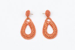  Stainless steel gold-colored statement earrings with an oval design. The earrings feature a textured, hammered finish for a unique, eye-catching look.